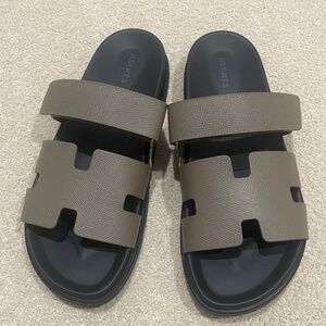 Coveted Hermès Brand New, Unworn Men's Etoupe Epsom Chypre sandals - Size 43